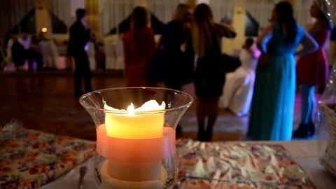 Burning candles on the party Stock Footage 98707359