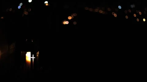Burning candles placed on graves in a quiet cemetery, 4K ultra HD. Stock Footage 320643202
