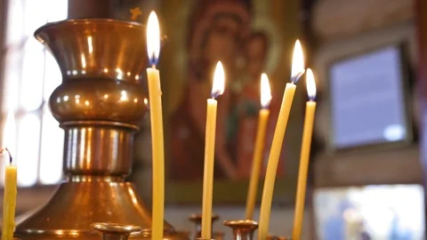 Burning candles. Religious memorial attribute of warmth and sincerity. Close up Stock Footage 119782194
