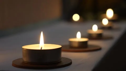 Burning candles in a row. Video stock 297881861