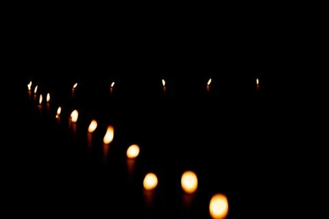 Burning Candles In A Row Stock Photos
