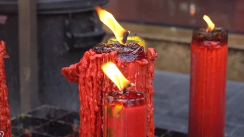 Burning candles, slow motion. Video stock 85944560