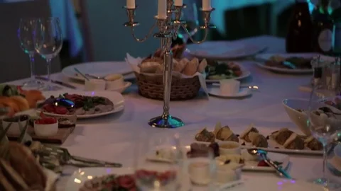 Burning candles on the table (move up) Stock Footage 71058913