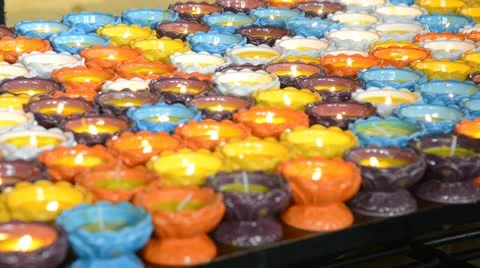 Burning candles in temple Stock Footage 22147734