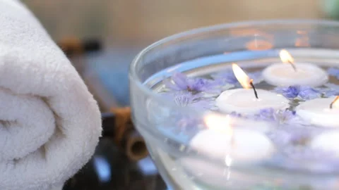 Burning candles in water. Composition of spa. Video stock 92358486