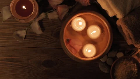 Burning candles in water. Composition of spa. Stock Footage 92358623