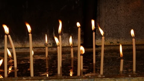 Burning candles in water with reflection Stock Footage 112351666