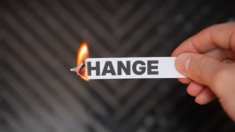 Burning “CHANGE” concept symbolizing transformation, fresh starts, personal Stock Footage 333654396