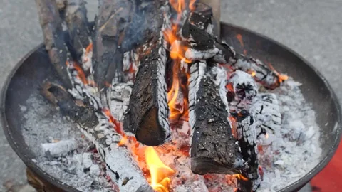 Burning charcoal in a fireplace Stock Footage 128980827