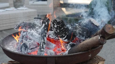 Burning charcoal in a fireplace Stock Footage 130381601