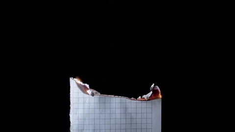 Burning Checkered Math Paper With Rising Smoke On Dark Black Background Stock Footage 330301251
