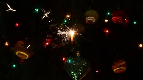 Burning Christmas sparklers Stock Footage 82497600