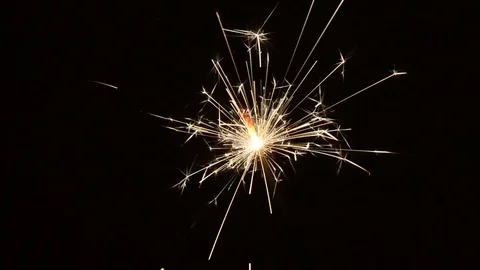 Burning Christmas sparklers Stock Footage 82497616