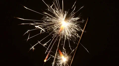 Burning Christmas sparklers Stock Footage 82497639