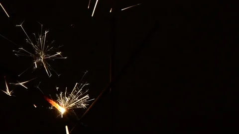 Burning Christmas sparklers Stock Footage 82497643