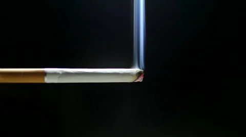 Burning cigarette on black background Stock Footage 47862276
