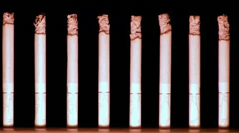 Burning cigarettes Stock Footage 10855017