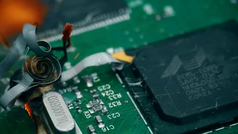 Burning Circuit Board Illustrating Technology Breakdown and Data Loss. Video stock 318444807