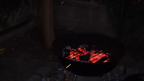 Burning coal in bbq grill Stock Footage 99144550