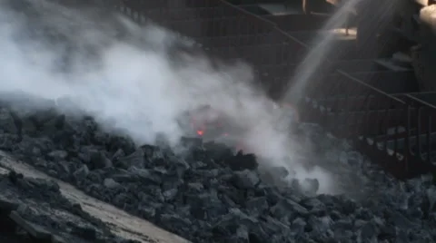 Burning coal is extinguished with water Stock Footage 56812382