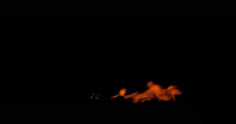 Burning coal in the fire. Closeup of flames effect isolated on black background  Stock Footage 142065927