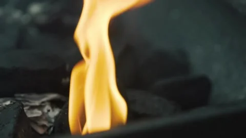 Burning coal fire red hot coals close-up in 4k HD 스톡 동영상 334651579