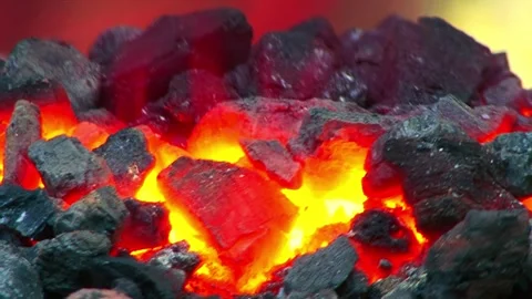 Burning coal fire red hot coals close-up in 4k HD 스톡 동영상 334651711