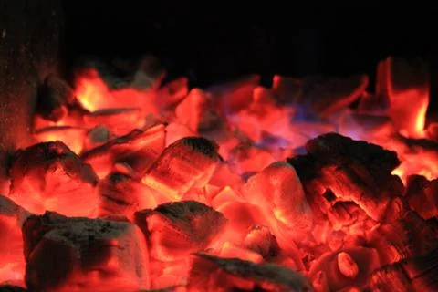 Burning coals in brazier Stock Photos