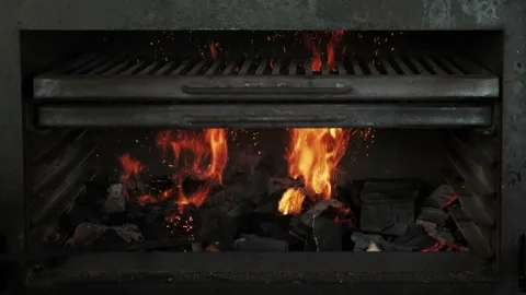 Burning coals in an empty grill. Grilled fire. Stock-Footage 153544076