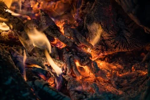 Burning coals from a fire abstract background Stock Photos