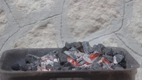 Burning coals on a grill. Stock Footage 83998910