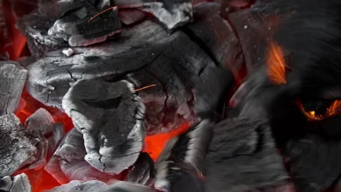 Burning coals in the grill. Summer BBQ. Close up Stock Footage 155774818