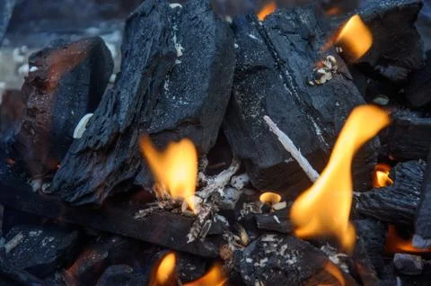 Burning coals Stock Photos