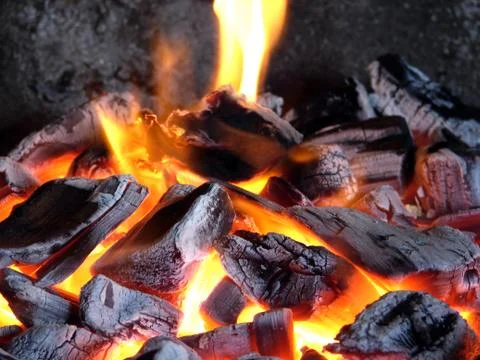 Burning coals Stock Photos