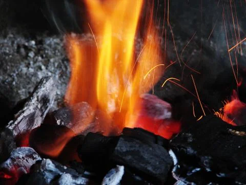 Burning coals Stock Photos