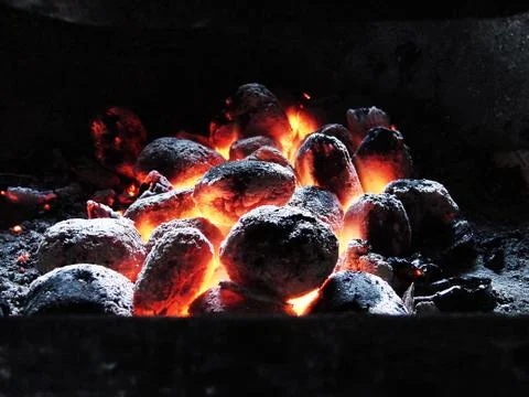 Burning coals Stock Photos