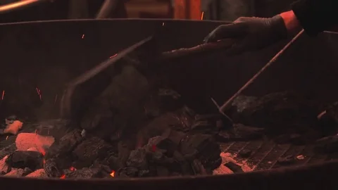 Burning Coals with Sparks, man puts coal into the furnace 動画素材 83792601