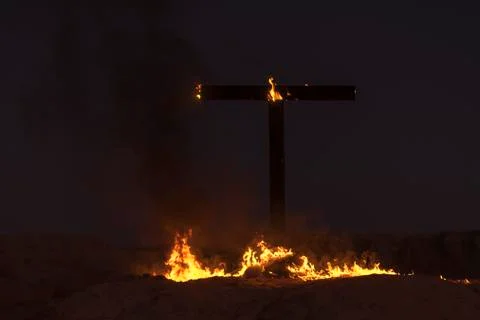 Burning Cross at night Stock Photos