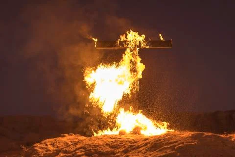 Burning Cross at night Stock Photos