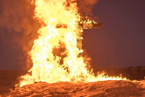 Burning Cross at night Stock Photos