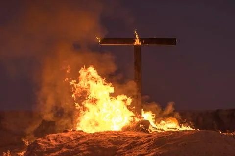 Burning Cross at night Stock Photos