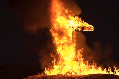 Burning Cross at night Stock Photos