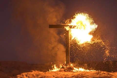 Burning Cross at night Stock Photos