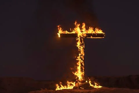 Burning Cross at night Stock Photos
