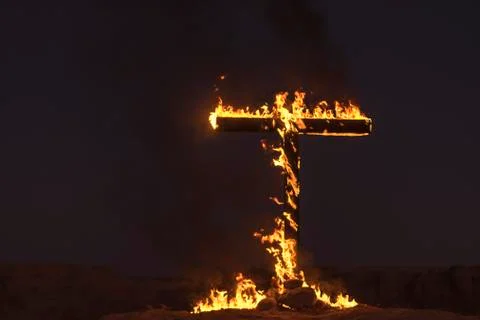 Burning Cross at night Stock Photos