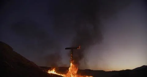 Burning Cross at night Stock Photos