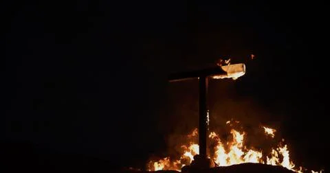 Burning Cross at night Stock Photos