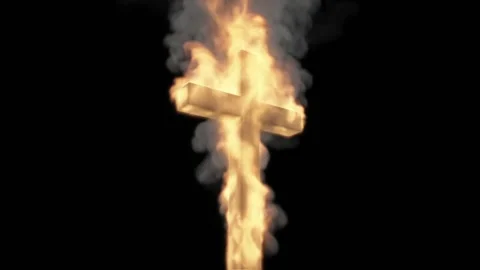 The burning cross stands slightly at an angle to the camera against a black Stock Footage 171016510