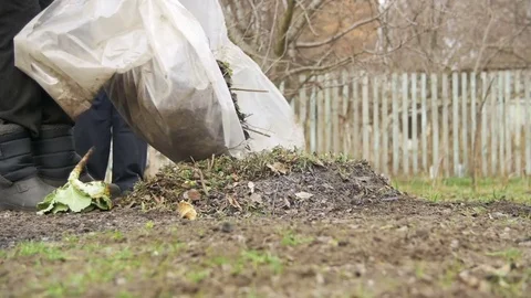 Burning Debris, Leaves, Small Trees and Weeds in the Garden on own Plot. Slow Vídeos de archivo 74012465