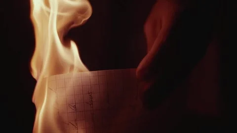 Burning Document in Darkness Stock Footage 263884650